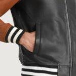 brown and black varsity jacket