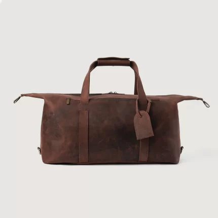 distressed brown leather duffle bag