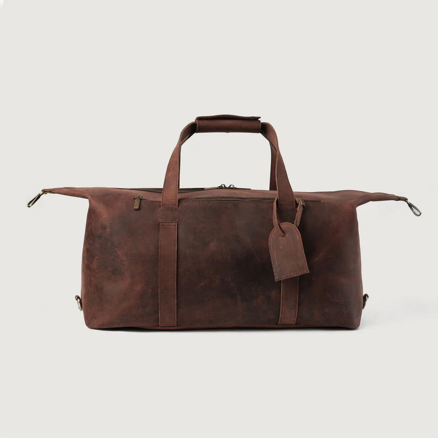 distressed brown leather duffle bag