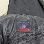 black bomber jacket with face mask