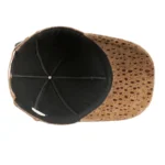 Snake print leather cap